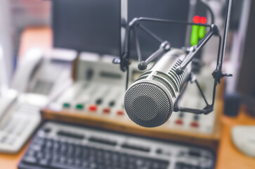 Professional microphone and sound mixer in radio station studio