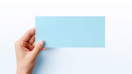 Fototapeta premium hand holding blue paper isolated on white background. concept cyber monday.
