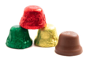 Unwrapped Bell Shaped Chocolate Candy on White Background