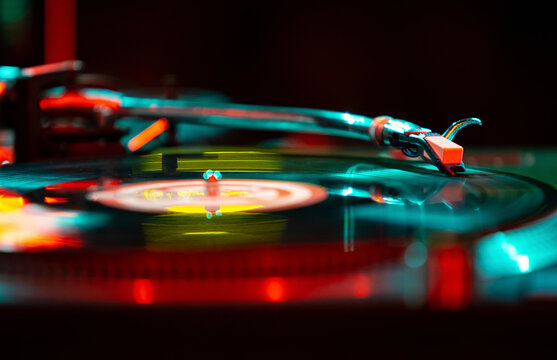 Dj turntable on stage. Turntables needle playing music in nightclub