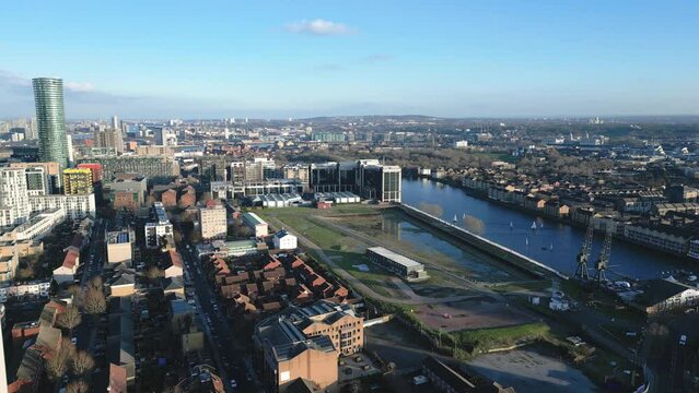 Wide aerial view over Isle of Dogs Millwall Outer Dock, London, UK
