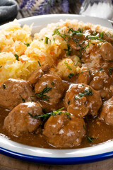 Minced meat balls in mushroom sauce.