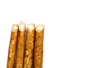 Burdock Root (Gobo) on white background.