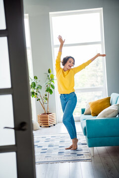 Photo of positive energetic lady enjoying buying rent new modern apartment dancing disco indoors inside