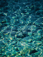 Crystal clear sea water and rocky bottom in Croatia. Transparent Adriatic sea shines in the bright sunlight © hurricanehank