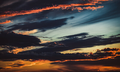 Fantastic sunset background. Dramatic clouds in the sky