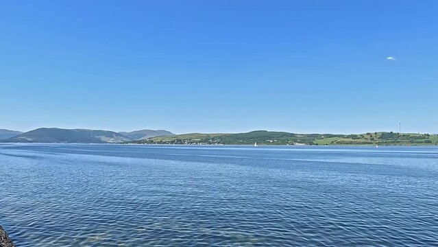 Greenock Esplanade View.  The view towards the coastal village of Kilcreggan from Greenock waterfront.  Greenock is a town located on the Firth of Clyde in the west of Scotland.