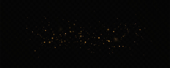 Golden sequins glow with many lights. Glittering dust. Luxurious background of golden particles.