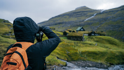 A photographer capturing the essence of Faroese charm. Through her lens, the quaint houses come to...