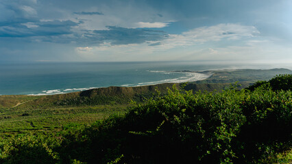 Tropical Paradise: A Breathtaking View of the Ocean from a Hilltop