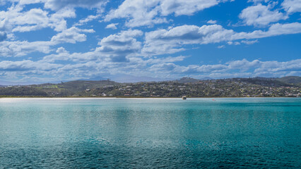 Tropical Paradise: A Panoramic View of Turquoise Waters and Blue Skies