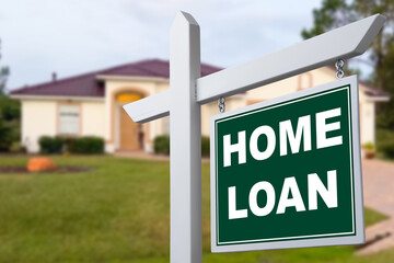 Obraz premium HOME LOAN sign against a house. Close-up.