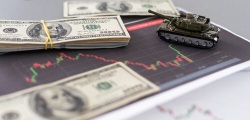 The main battle tank on US dollar bill banknotes background. U.S.A. and China trade war and...