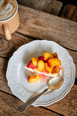 cheesecake. cottage cheese casserole with strawberry-nectarine sauce. Top view, wooden background.