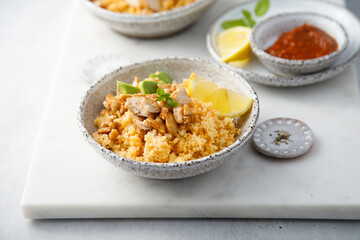 Chicken with couscous and avocado