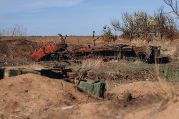 Fototapeta na wymiar Mykolaiv region, Ukraine - 10 October 2023, Trenches of the Former Russian army position Defense Brigade. The remaining part of tank left in the field , invasion campaign in southern Ukraine, war