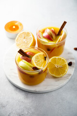 Hot apple cider with lemon and spices