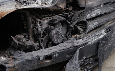 Burnt car after accident or short circuit of car wiring. Insurance compensation after car arson...