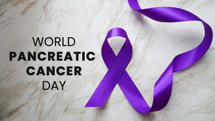 World pancreatic cancer day with purple ribbon. Pancreatic cancer concept, treatment and health awareness. Purple ribbon with pancreatic cancer awareness. - obrazy, fototapety, plakaty