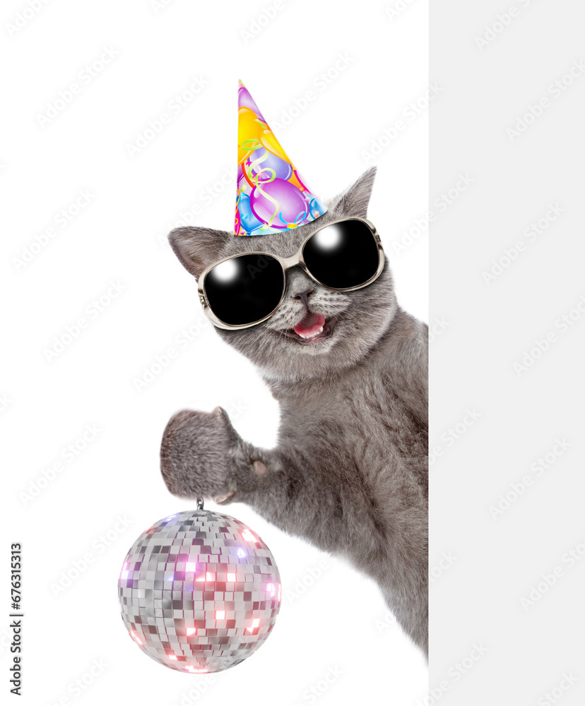Aufkleber happy cat wearing sunglasses and party cap looks from behind empty banner and shows dico ball. isola