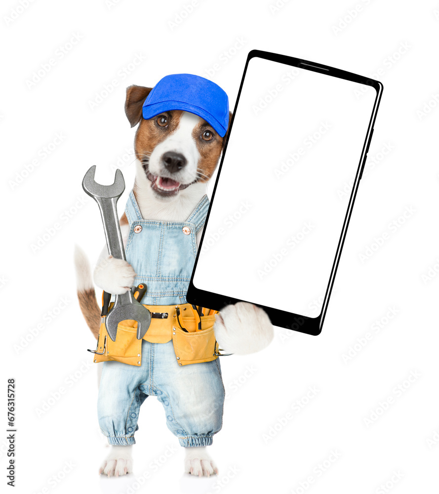 Aufkleber funny puppy wearing denim overalls with tool belt holding wrench and showing big smartphone with whi
