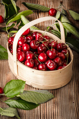 Sweet cherries in a wooden basket.