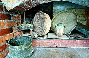 Old stove and kitchen utensils for cooking