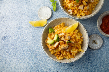 Chicken with couscous and avocado