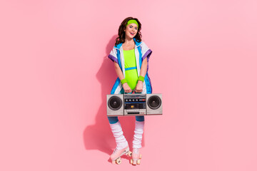 Photo of sportive lady trainer enjoy rhythm exercise with boom box isolated on pastel color background