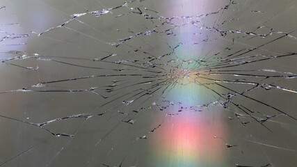 damaged LCD screen with cracks, full-frame background.