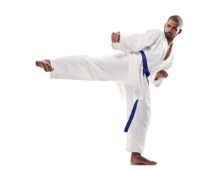 Man, karate and kick in martial arts or self defense training with blue belt isolated on a transparent PNG background. Active male person or fighter in pose or technique for taekwondo or fitness - Powered by Adobe