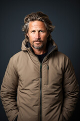 Obraz premium Middle-aged man portrait wearing anorak jacket