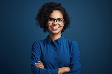 Photo portrait of lovely young lady folded arms confident pose wear trendy blue blouse isolated on dark blue color background.