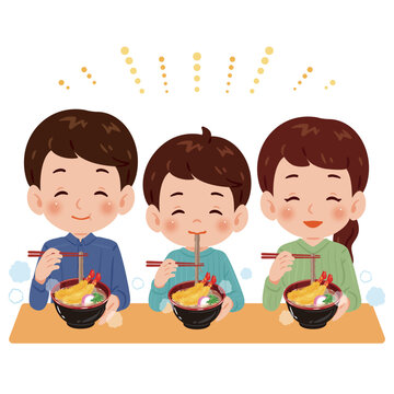海老天蕎麦を食べる家族