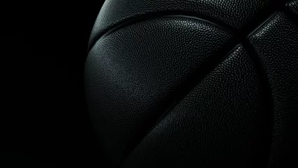 Foto op Plexiglas Photo of a black basketball ball on a black background. © phaisarnwong2517