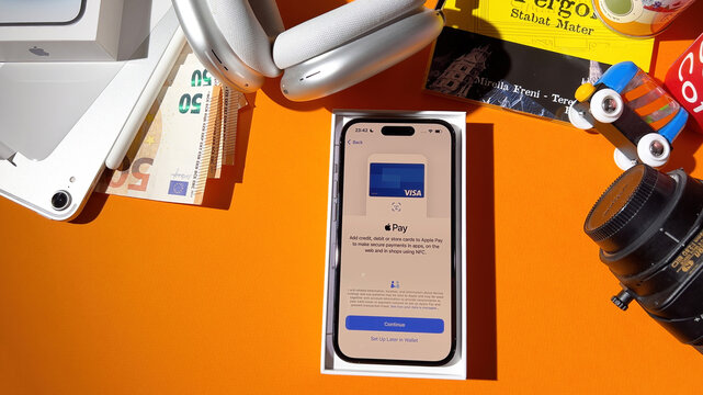 Paris, France - Sep 22, 2023: During the official unboxing, users can add debit or credit cards to the new Apple iPhone 14 Pro Max smartphone for immediate use and convenience