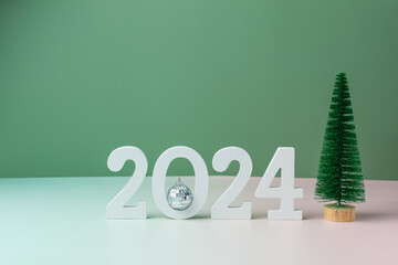 numbers 2024 with Christmas trees . Happy New Year 2024 is coming concept.