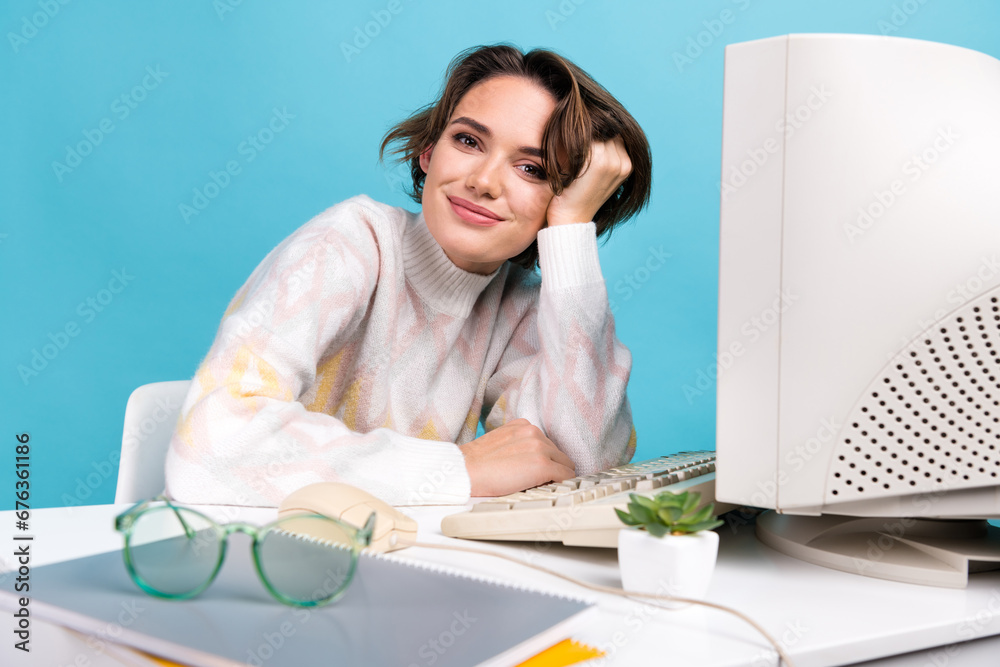 Wall mural photo of pretty positive person enjoy pause break old pc desktop workstation isolated on blue color 