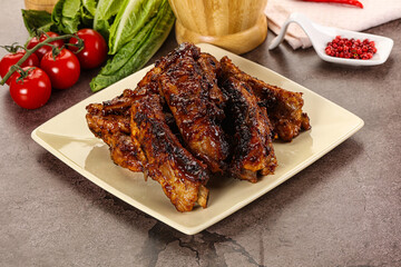 Grilled pork ribs in barbecue sauce