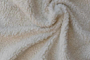 Fototapeta na wymiar White soft plush lamb wool fabric background