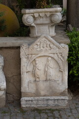 Old plaster sculptures and bas-reliefs, wall texture and patterns. Elements of architectural decorations of buildings. On the streets in Istanbul, public places.