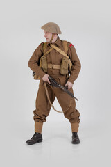 The man is an actor in vintage military uniform of the American soldier, period World War I, 1914-1918