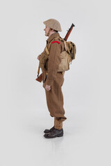 The man is an actor in vintage military uniform of the American soldier, period World War I, 1914-1918