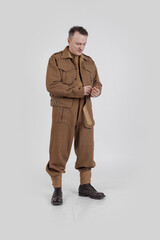 Obraz premium The man is an actor in vintage military uniform of the American soldier, period World War I, 1914-1918
