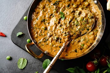 Homemade Methi Matar Malai -Indian vegetarian curry served with roti, selective focus - obrazy, fototapety, plakaty