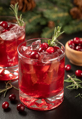 Cranberry cocktail with fresh cranberries and rosemary