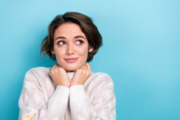 Photo portrait of lovely young lady turtleneck collar look empty space dressed stylish white garment isolated on blue color background