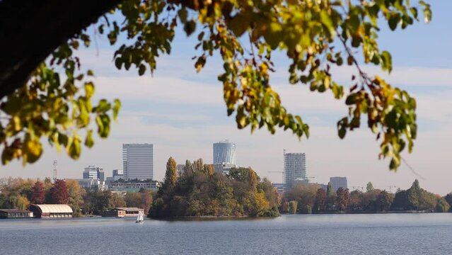 Bucharest during a beautiful autumn day, view to King Michael I Park. Modern office skyscraper buildings from Pipera, Baneasa Bucharest. 4k video.