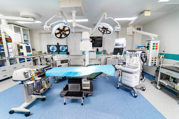 Modern emergency operating room. Empty surgery sterile medical equipment.