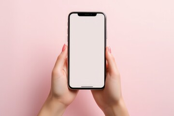Female hands holding a smartphone with a white screen on a pink background. Generative AI.